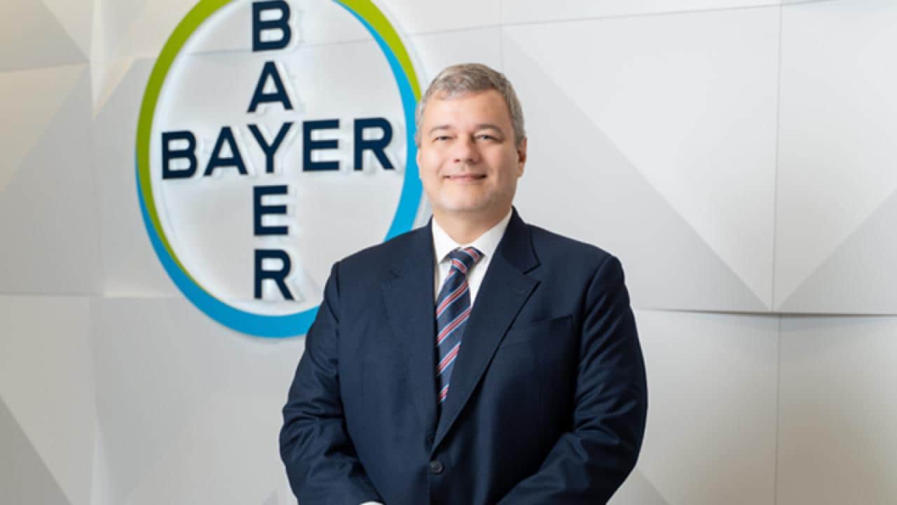 Ingo Brandenburg photo with Bayer logo